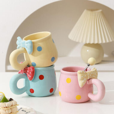 3D bow tie ceramic mugs in pastel colors on white background