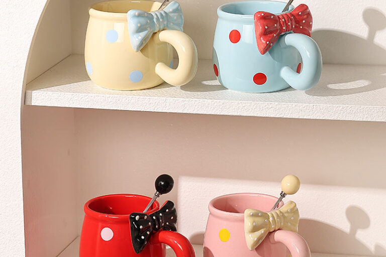 3D bow tie ceramic mugs in pastel colors on white background