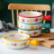 Cute ceramic bowl with colorful handle and printed pattern