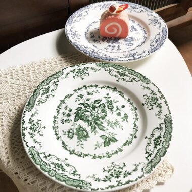 Vintage round crockery plates with floral design