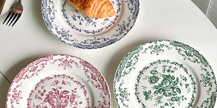 Vintage round crockery plates with floral design