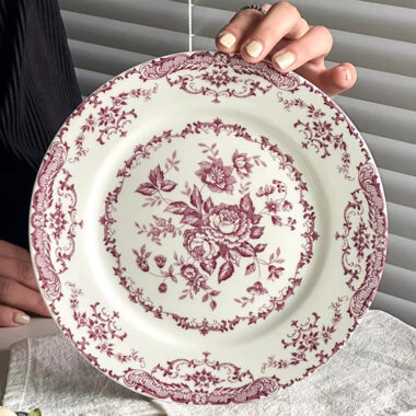 Vintage round crockery plates with floral design