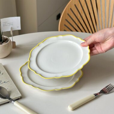 Minimalist yellow rim ceramic crockery plates for steak
